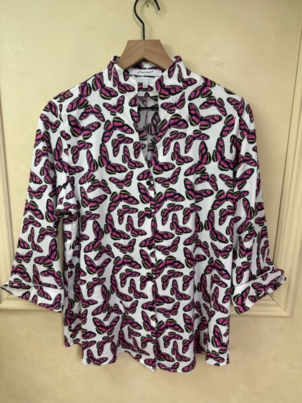 Foxcroft Wrinkle Free vibrant pink butterfly print on a white background